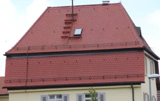 Steildach mit Gaube und Dachfenster sanieren lassen